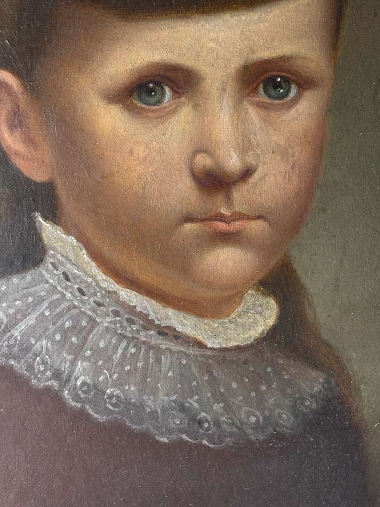 Late 19th Century American Folk Portrait of Young Girl with Blue Ribbon Oil on artist board, American, circa 1880–1895.