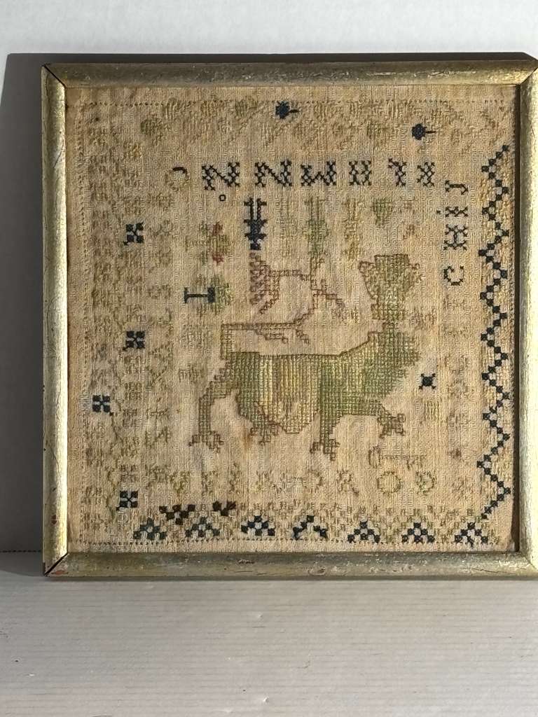 Small-Format Anglo-American Needlework Sampler with Heraldic Lion and Key Motif, likely New England, circa 1790–1810.