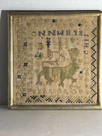 Small-Format Anglo-American Needlework Sampler with Heraldic Lion and Key Motif, likely New England, circa 1790–1810.