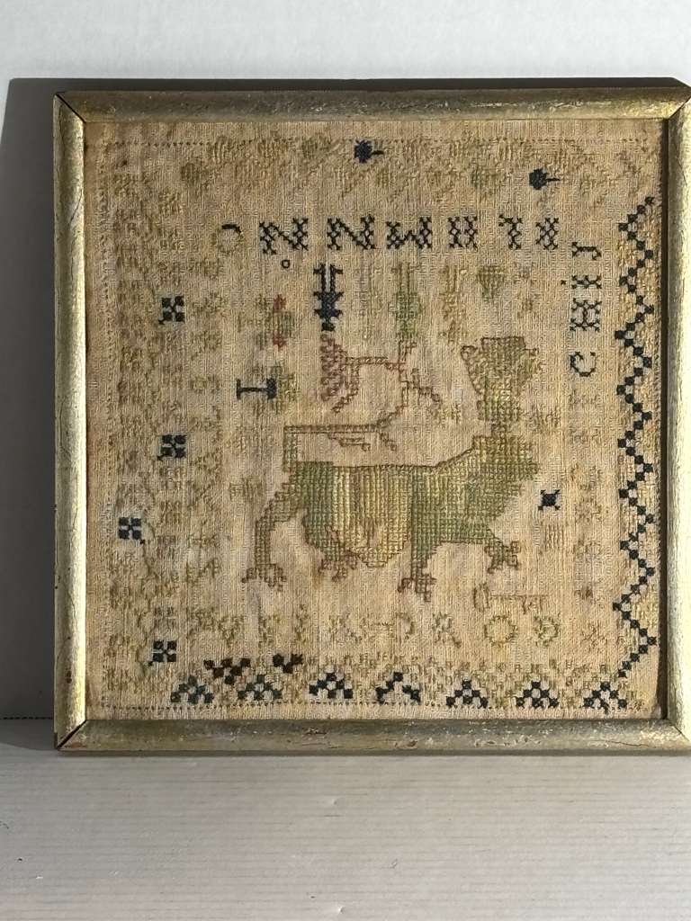 Small-Format Anglo-American Needlework Sampler with Heraldic Lion and Key Motif, likely New England, circa 1790–1810.