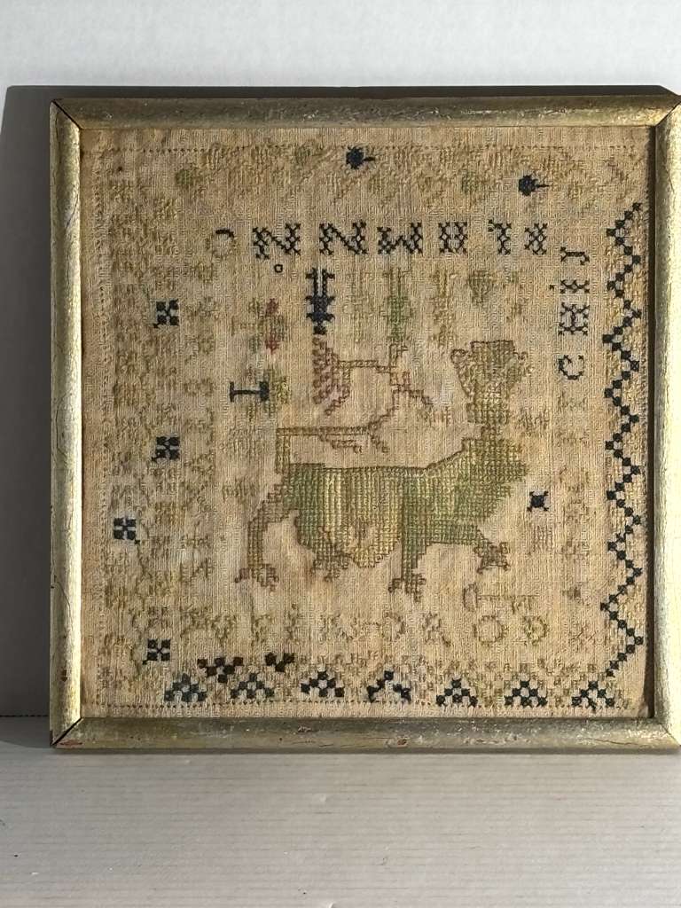 Small-Format Anglo-American Needlework Sampler with Heraldic Lion and Key Motif, likely New England, circa 1790–1810.