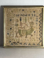 Small-Format Anglo-American Needlework Sampler with Heraldic Lion and Key Motif, likely New England, circa 1790–1810.