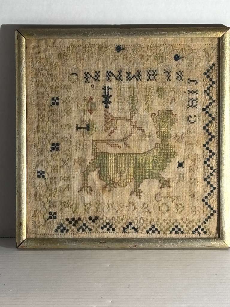 Small-Format Anglo-American Needlework Sampler with Heraldic Lion and Key Motif, likely New England, circa 1790–1810.