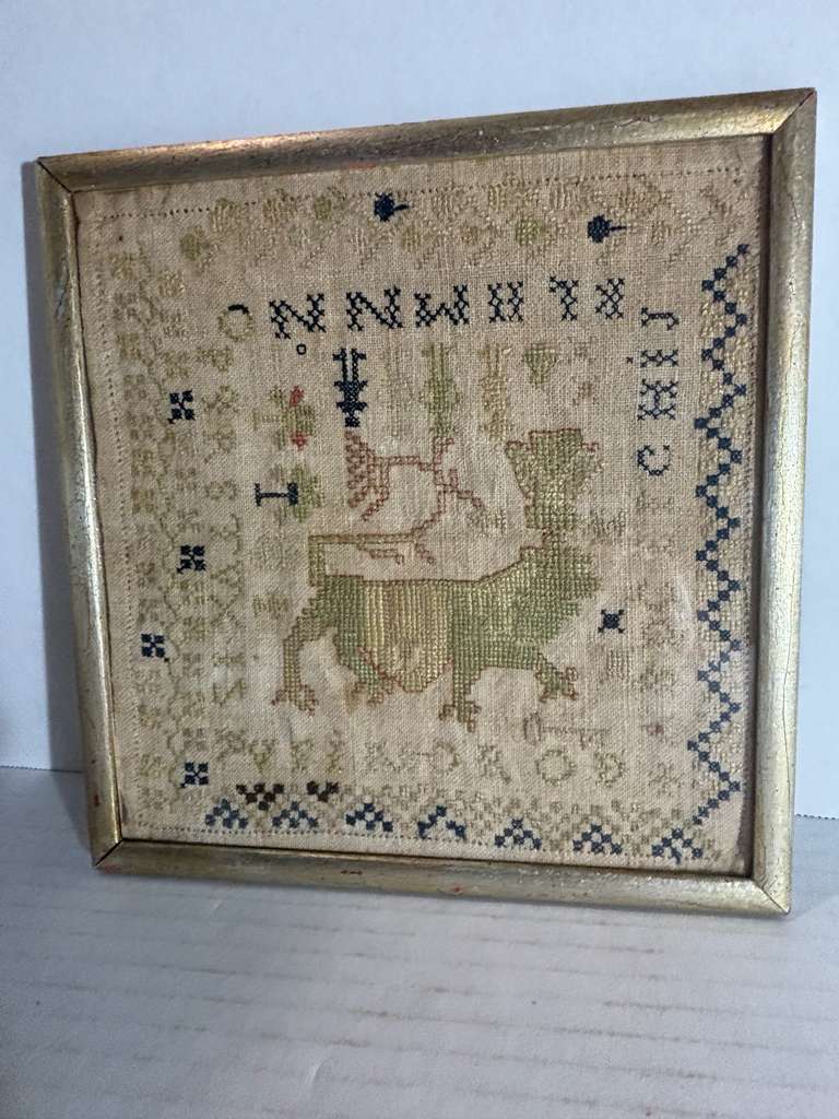 Small-Format Anglo-American Needlework Sampler with Heraldic Lion and Key Motif, likely New England, circa 1790–1810.