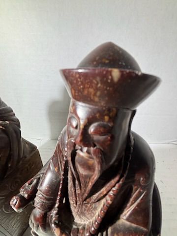 Two Chinese Carved Brown Mottled Hardstone Figural Table Carvings