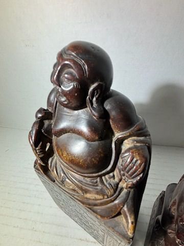 Two Chinese Carved Brown Mottled Hardstone Figural Table Carvings