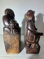 Two Chinese Carved Brown Mottled Hardstone Figural Table Carvings