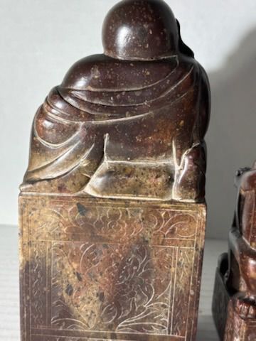 Two Chinese Carved Brown Mottled Hardstone Figural Table Carvings