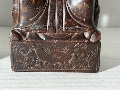 Two Chinese Carved Brown Mottled Hardstone Figural Table Carvings