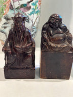 Two Chinese Carved Brown Mottled Hardstone Figural Table Carvings