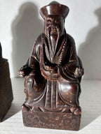 Two Chinese Carved Brown Mottled Hardstone Figural Table Carvings