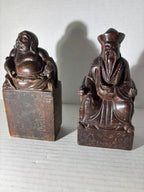 Two Chinese Carved Brown Mottled Hardstone Figural Table Carvings