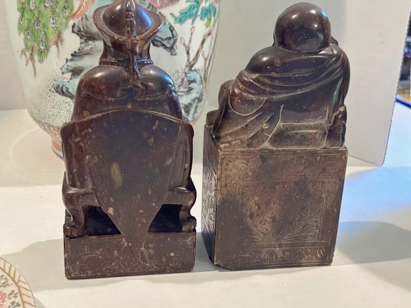 Two Chinese Carved Brown Mottled Hardstone Figural Table Carvings