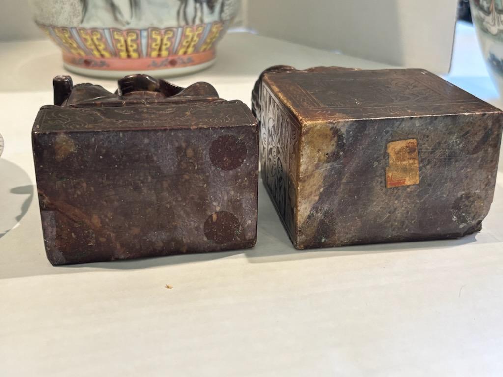 Two Chinese Carved Brown Mottled Hardstone Figural Table Carvings