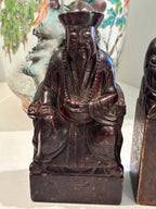 Two Chinese Carved Brown Mottled Hardstone Figural Table Carvings