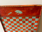 American Folk Art Painted Checkerboard with Whimsical Pig Motif, circa 1890–1925.
