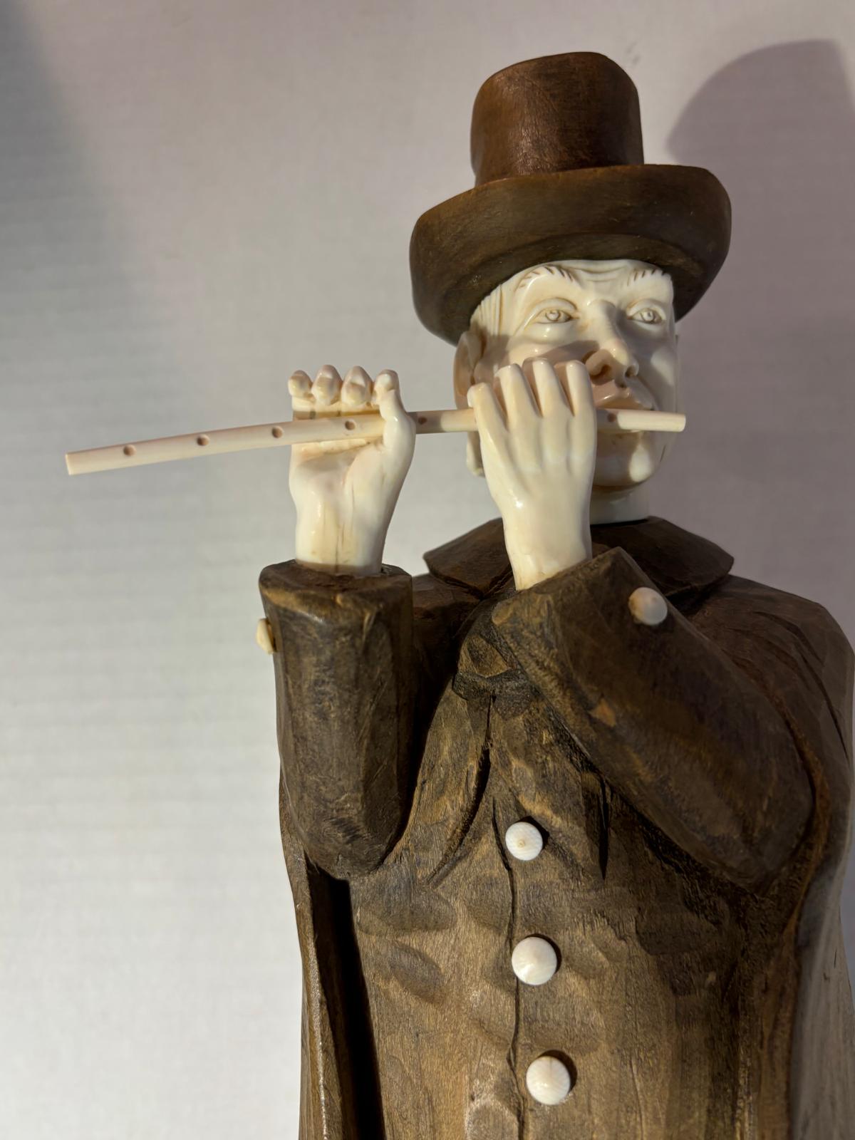 Carved Wood and Bovine Bone Figural Sculpture of a Flute-Playing Gentleman