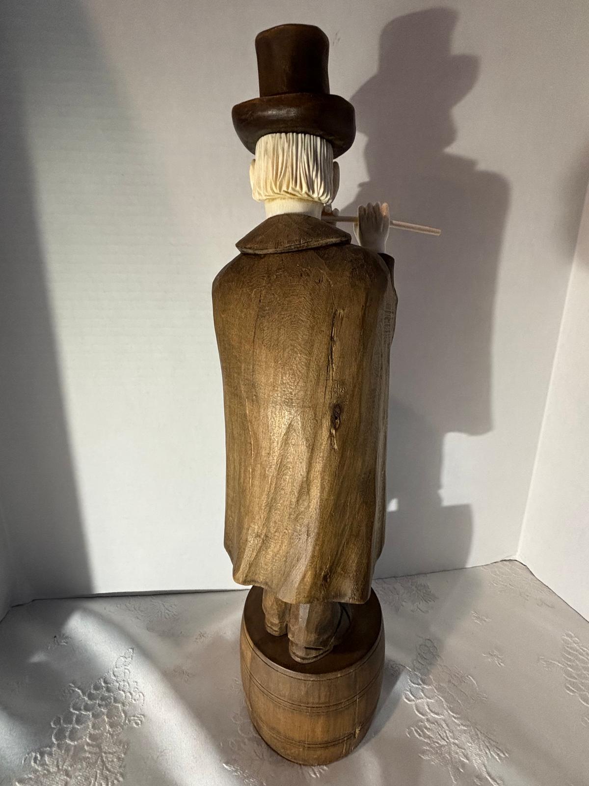 Carved Wood and Bovine Bone Figural Sculpture of a Flute-Playing Gentleman