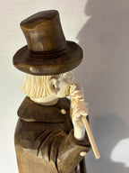 Carved Wood and Bovine Bone Figural Sculpture of a Flute-Playing Gentleman