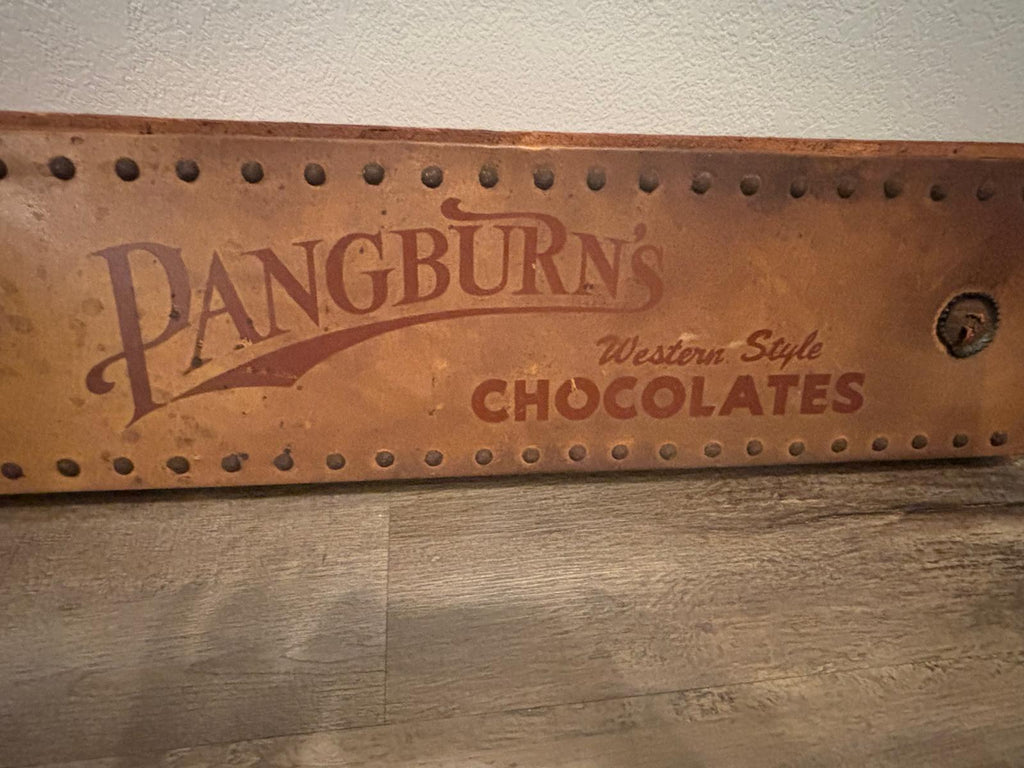 Rare Pangburn’s Chocolates double-sided leather trade sign, Fort Worth, Texas, circa 1915–1925.